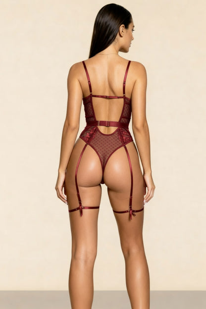 Slip into this Bordeaux lace bodysuit. Soft, sheer, and sculpting your natural curves for an instantly confident, sexy look